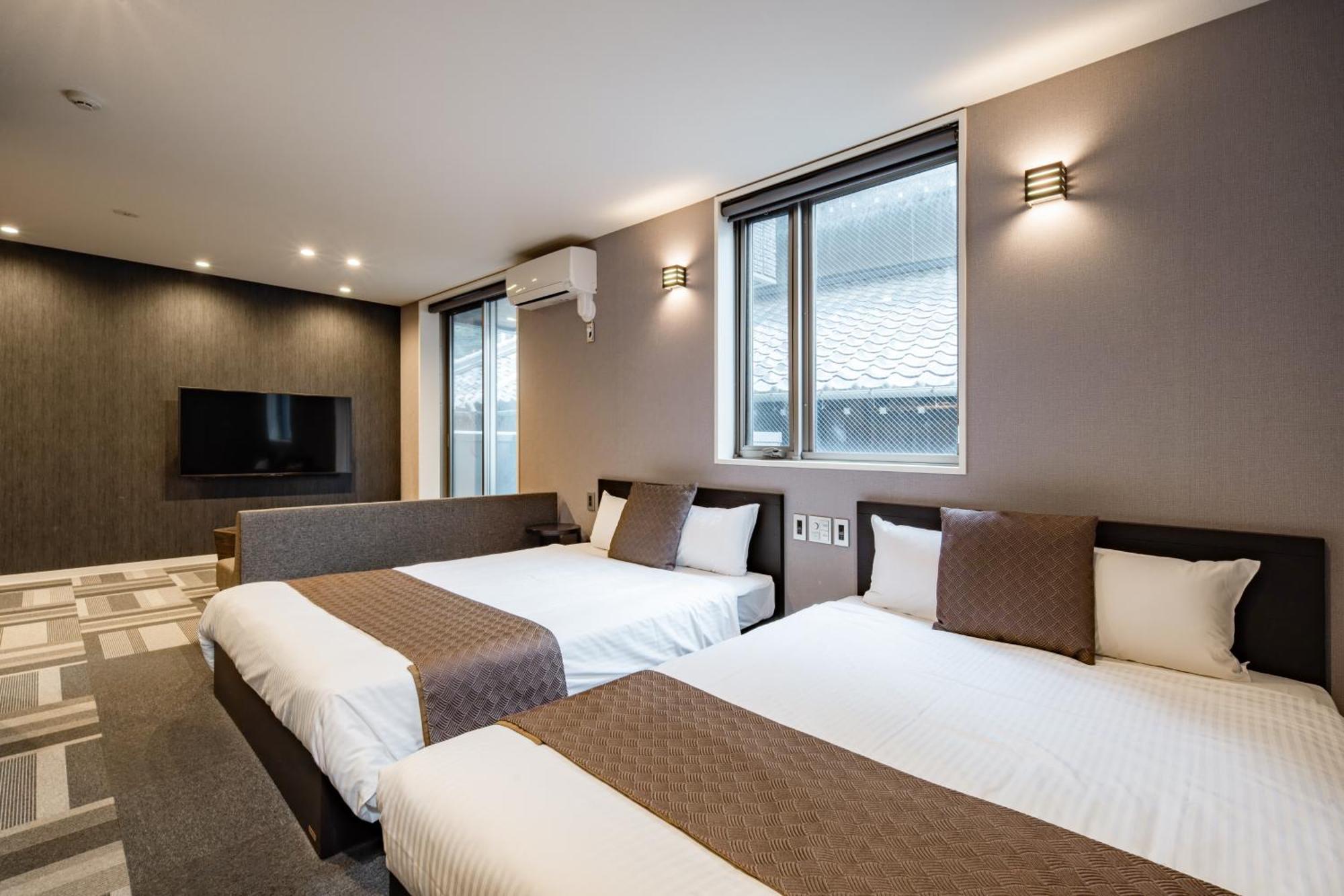 แกรนด์ เบส โมจิ นาโงมิ Aparthotel คิตะคิวชู ภายนอก รูปภาพ